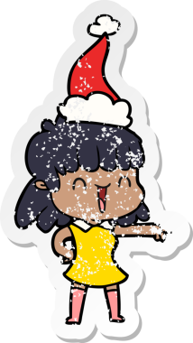 Bir insan tarafından çizilmiş Noel Baba şapkası takan mutlu bir kızın el yazısı.