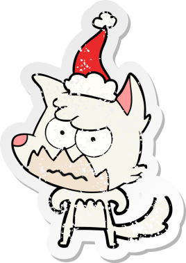 Bir insan tarafından çizilmiş Noel Baba şapkası giymiş sinirli bir tilkinin el yazısı.