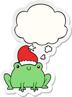 Düşünce baloncuğu insan tarafından çizilmiş bir çıkartma olan şirin bir karikatür Noel kurbağası.