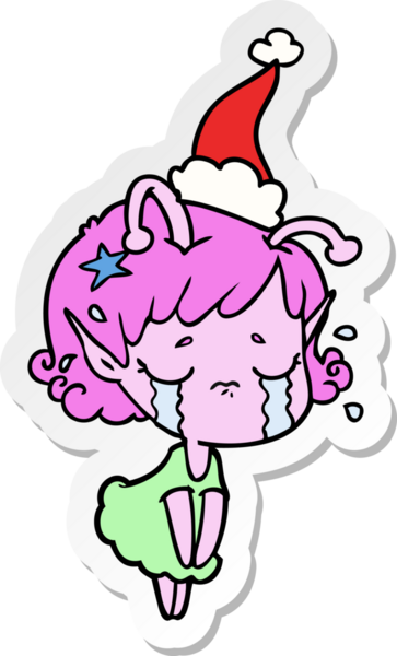 Bir insan tarafından çizilmiş, ağlayan, Noel Baba şapkası takan uzaylı bir kızın el yazısı.