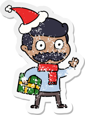 El çizimi, bıyıklı ve noel hediyesi olan bir adamın insan tarafından çizilmiş Noel Baba şapkası.