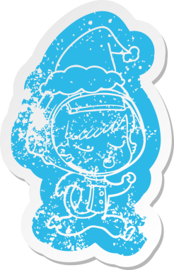 Garip bir çizgi film, bir insan tarafından çizilmiş Noel Baba şapkası giyen güzel bir astronot kızın çıkartması.