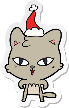 Bir insan tarafından çizilmiş Noel Baba şapkası takan bir kedinin el yazısı.