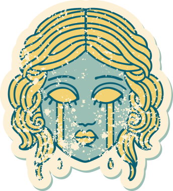 Bir insan tarafından çizilmiş ağlayan kadın yüzünün sembolik dövmeli görüntüsü.