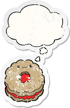 Düşünce baloncuklu çizgi film bisküvisi insan tarafından çizilmiş yıpranmış bir çıkartma.