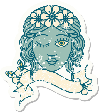 Bir insan tarafından çizilmiş, üzerinde bakirelerin yüzü olan eski bir çıkartma.