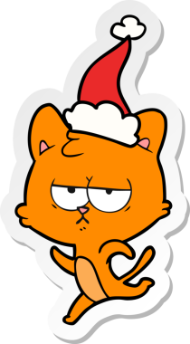 Bir insan tarafından çizilmiş Noel Baba şapkası takan bir kedinin çizilmiş el yazısı.