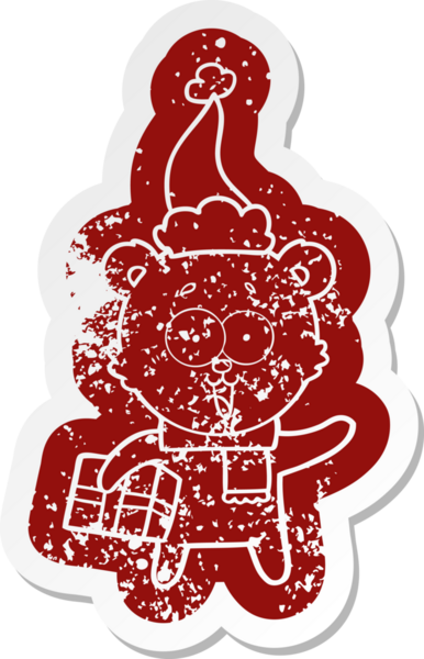 Bir insan tarafından çizilmiş Noel Baba şapkasıyla gülen oyuncak ayı.