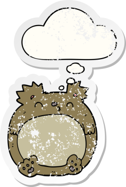 Düşünce baloncuğu olan çizgi film ayısı bir insan tarafından çizilmiş yıpranmış bir çıkartma.