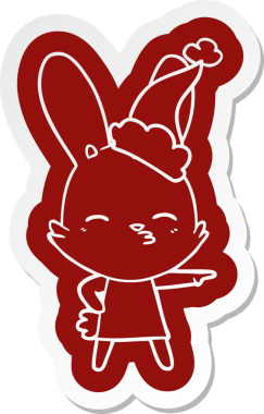 Bir insan tarafından çizilmiş Noel Baba şapkasının garip bir karikatür çıkartması.