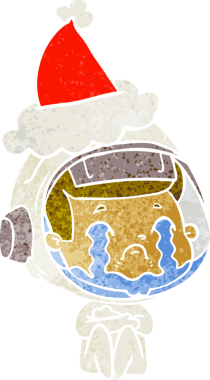 Bir insan tarafından çizilmiş Noel Baba şapkası giyen ağlayan bir astronotun el çizimi karikatürü.
