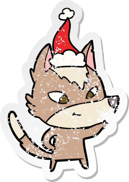 Dost canlısı el, bir insan tarafından çizilmiş Noel Baba şapkası takan bir kurt çıkartması çizmiş.