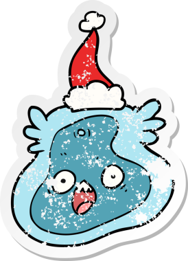 Bir insan tarafından çizilmiş Noel Baba şapkası takan bir mikrop çıkartması.