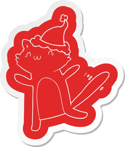 Bir insan tarafından çizilmiş Noel Baba şapkası giyen dans eden bir kedinin garip çizgi film çıkartması.