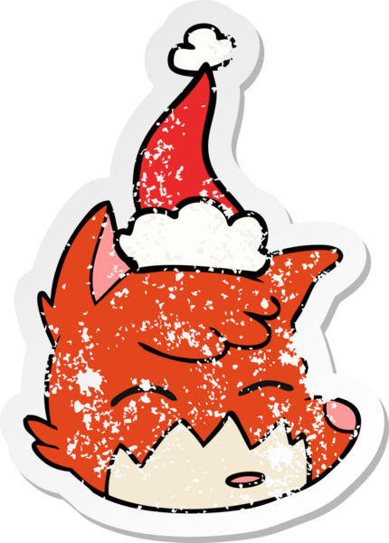 Bir insan tarafından çizilmiş Noel Baba şapkası giymiş tilki suratlı bir karikatür.