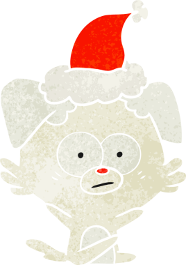 Gergin köpek eli, bir insan tarafından çizilmiş Noel Baba şapkasının eski çizgi filmini çizdi.