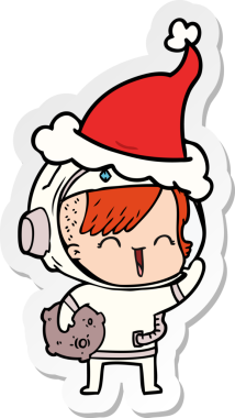 Bir insan tarafından çizilmiş Noel Baba şapkası takan mutlu bir uzay kızının el yazısı.