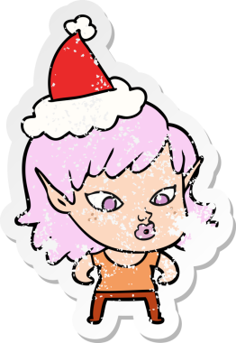 Bir insan tarafından çizilmiş Noel Baba şapkası takan bir elf kızı çizilmiş güzel bir el yazısı.