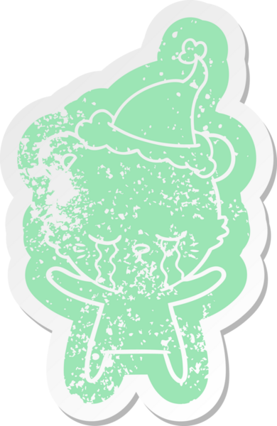 Ağlayan karikatür, bir insan tarafından çizilmiş Noel Baba şapkası giyen bir kutup ayısının etiketi.