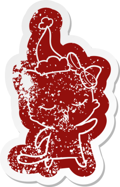 Kafasında fiyonk olan bir kedinin insan tarafından çizilmiş Noel Baba şapkası giymesi garip bir karikatür.