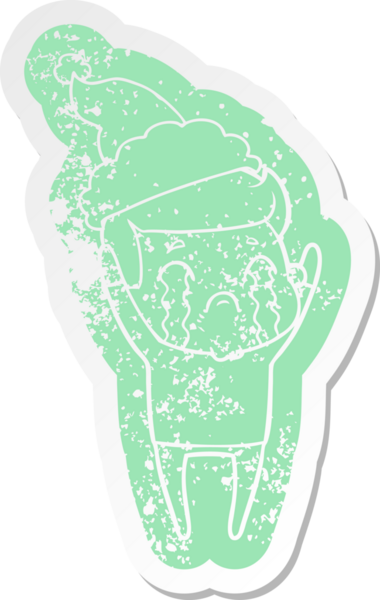 Garip bir çizgi film. Ağlayan bir adamın çıkartması. Bir insan tarafından çizilmiş Noel Baba şapkasıyla.