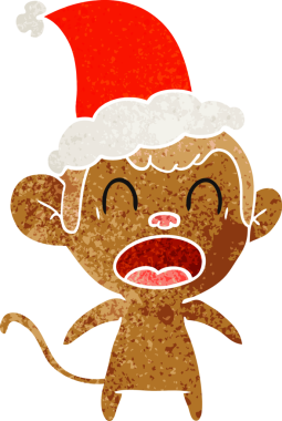 Bir insan tarafından çizilmiş Noel Baba şapkası giymiş bir maymunun el çizimi karikatürü.