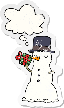 Düşünce baloncuğu olan kardan adam bir insan tarafından çizilmiş yıpranmış bir çıkartma.