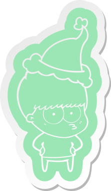 Bir insan tarafından çizilmiş Noel Baba şapkası takan bir çocuğun garip çizgi film çıkartması.