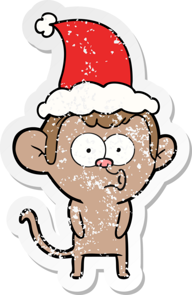 Bir insan tarafından çizilmiş Noel Baba şapkası takan öten bir maymunun çizilmiş el yazısı.