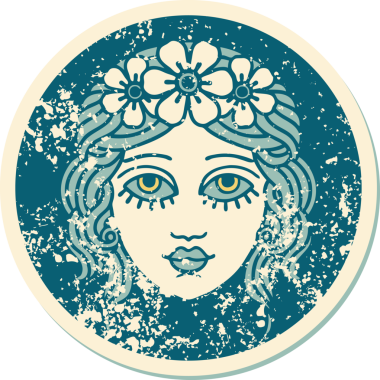 Bir insan tarafından çizilmiş çiçek desenli kadın yüzünün sembolik dövmesi.