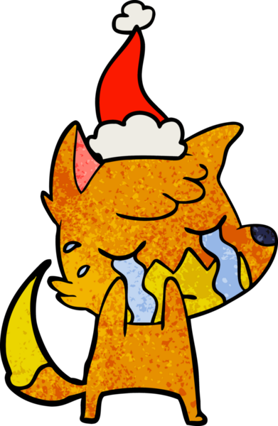 Ağlayan tilki eli bir insan tarafından çizilmiş Noel Baba şapkası.