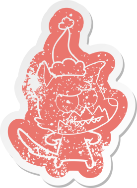 Bir insan tarafından çizilmiş Noel Baba şapkası giymiş sırıtan tilki çıkartması.