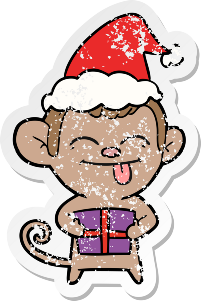 Noel hediyesi olan bir maymunun insan tarafından çizilmiş Noel Baba şapkasıyla çizilmiş komik bir el çizimi.