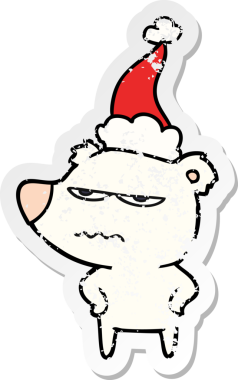 Kızgın ayı kutup eli, bir insan tarafından çizilmiş Noel Baba şapkasının sıkıntılı çıkartmasını çizmiş.