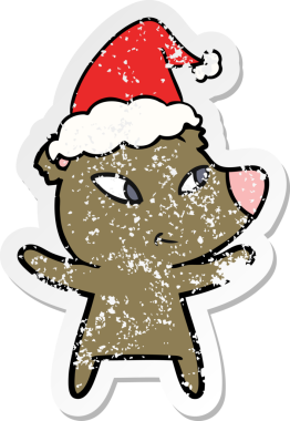 Bir insan tarafından çizilmiş Noel Baba şapkası takan bir ayının çizilmiş tatlı eli.