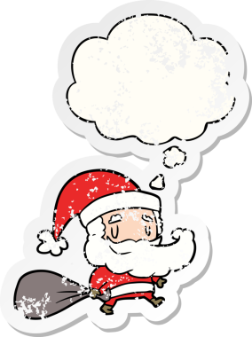 Düşünce baloncuklu çuval taşıyan çizgi film Noel Baba 'sı bir insan tarafından çizilmiş yıpranmış bir çıkartma.