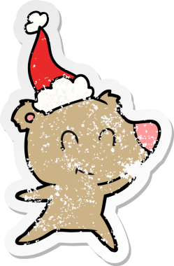 Kadın ayı eli, bir insan tarafından çizilmiş Noel Baba şapkasının çizilmiş çıkartması.