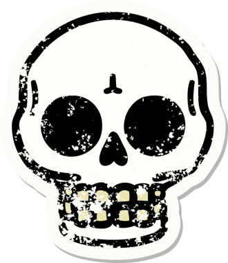 Bir insan tarafından çizilmiş geleneksel bir kafatası stili dövmesi var.