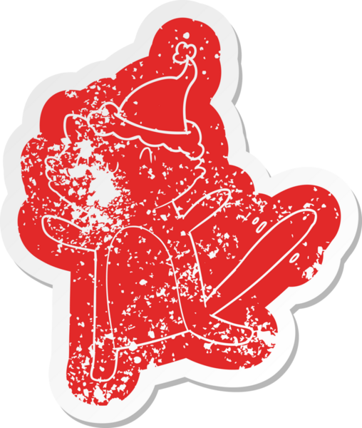 Bir insan tarafından çizilmiş Noel Baba şapkası takan bir kedinin garip bir karikatürü.