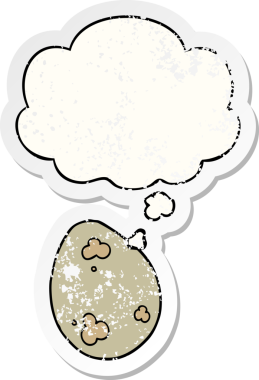 Düşünce baloncuklu çizgi film yumurtası insan tarafından çizilmiş yıpranmış bir çıkartma gibi.