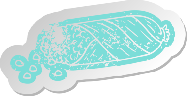 Bir insan tarafından çizilmiş mısır koçanının üzerinde eski bir karikatür çıkartması var.