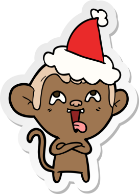 Bir insan tarafından çizilmiş Noel Baba şapkası giyen bir maymunun çılgın el çizimi karikatürü.
