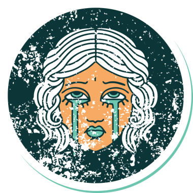 Bir insan tarafından çizilmiş ağlayan kadın yüzünün sembolik dövmeli görüntüsü.