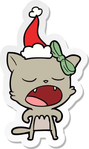 Bir insan tarafından çizilmiş Noel Baba şapkası giymiş bir kedi miyavlıyor.