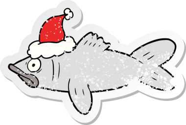 Bir insan tarafından çizilmiş Noel Baba şapkası giymiş bir balığın el çizimi karikatürü.