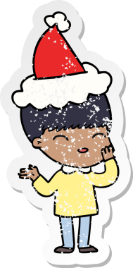 Mutlu el, bir insan tarafından çizilmiş Noel Baba şapkası takan bir çocuğun kederli çıkartması.