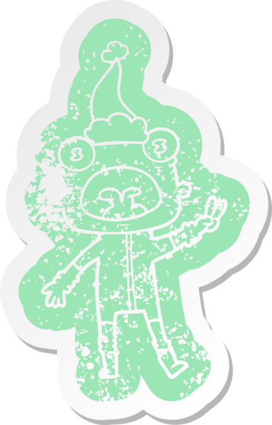 Garip bir çizgi film, bir insan tarafından çizilmiş Noel Baba şapkası takan garip bir uzaylının çıkartması.