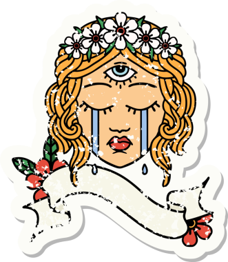 Üzerinde kadın yüzü bayrağı olan eski bir çıkartma mistik üçüncü gözü bir insan tarafından çizilmiş.