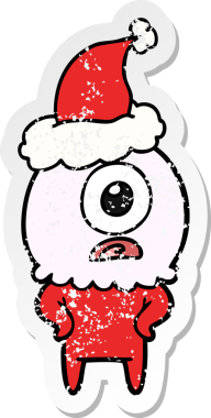 Bir insan tarafından çizilmiş Noel Baba şapkası giyen uzaylı bir Tepegöz 'ün kederli çıkartması.