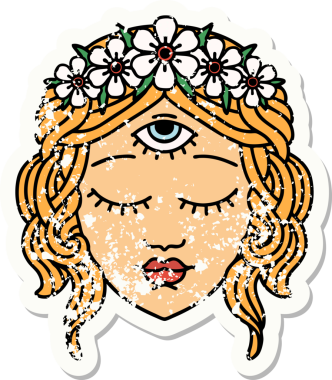 Bir insan tarafından çizilmiş üçüncü göz ve çiçek tacıyla geleneksel kadın yüzü stili dövmesi.